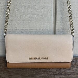 Michael Kors Beige and Brown wallet on a chain.